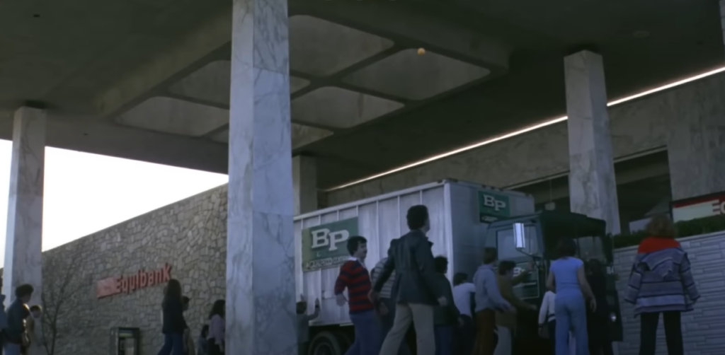 Individuals standing outside the bank's entrance